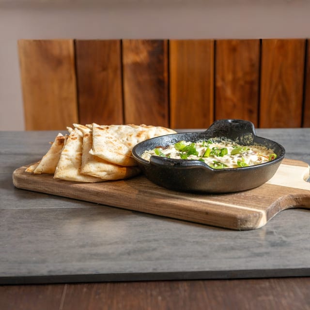 Boar Bacon Artichoke Dip.
